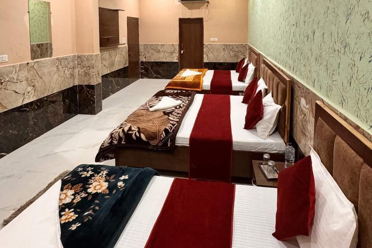 Quadruple Room | Free rollaway beds, free WiFi, bed sheets