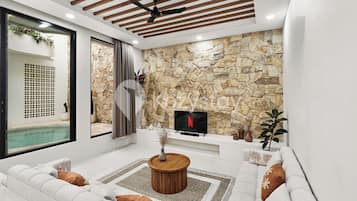 Villa, 3 Bedrooms, Pool View | Living area | 55-inch Smart TV with cable channels, Netflix, streaming services