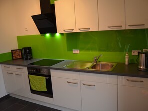 Fridge, microwave, oven, cookware/dishes/utensils