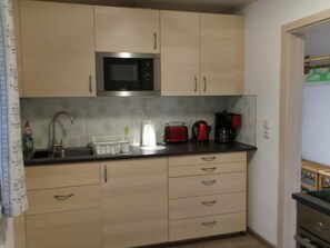 Fridge, microwave, oven, cookware/dishes/utensils - Fewo "Am Skihang EG" by Interhome (Carlsfeld)