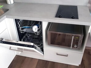 Fridge, microwave, dishwasher, cookware/dishes/utensils
