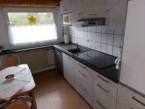 Fridge, microwave, dishwasher, cookware/dishes/utensils
