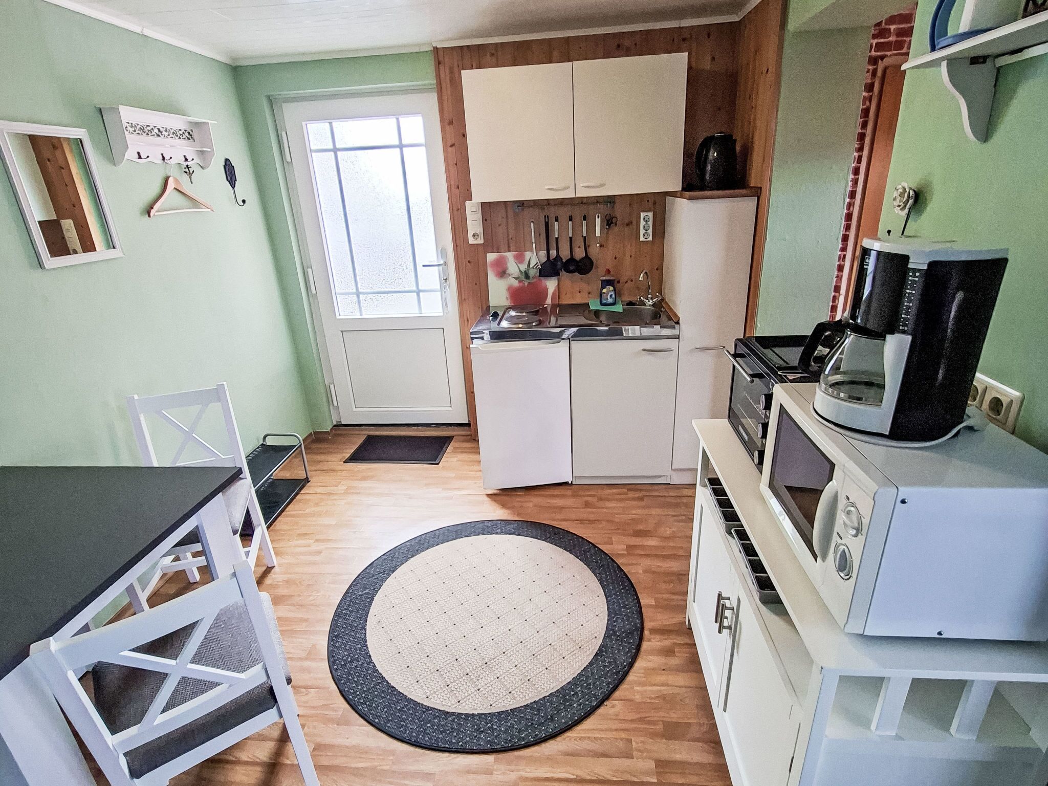 Fridge, microwave, cookware/dishes/utensils