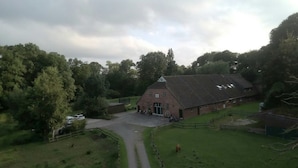 A rural barn with a dirt driveway leading to a gated entrance. - Landhaus Markus by Interhome (Süderschwei)