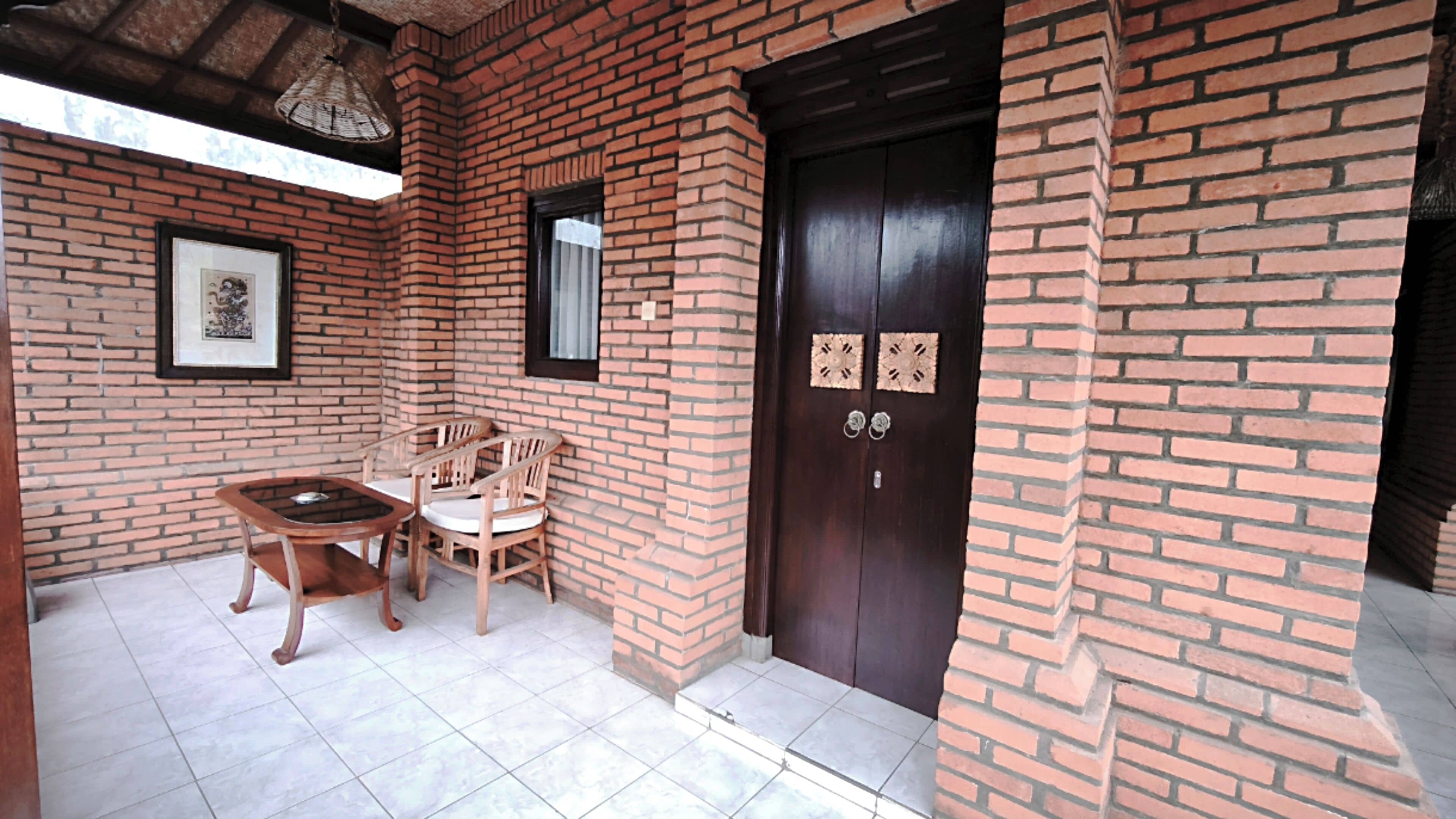 Deluxe tweepersoonskamer, uitzicht op tuin | Balkon