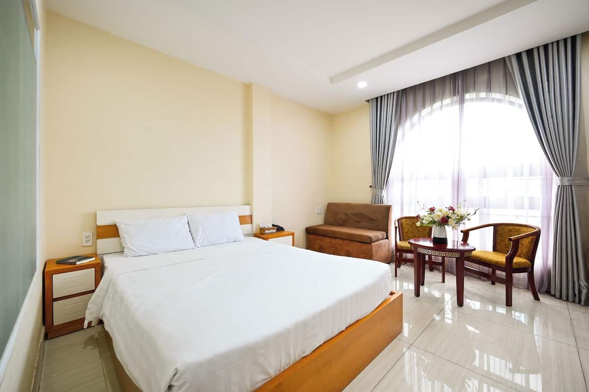 ห้องดีลักซ์ดับเบิล, วิวเมือง | เครื่องนอนระดับพรีเมียม, เตียงพร้อมฟูกเสริมที่นอน, มินิบาร์
