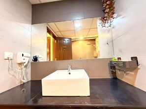 Artículos de tocador gratuitos, pantuflas, jabón, shampoo