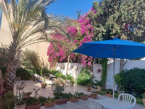 Terrace/patio - "Gartengeschoss" by Interhome (Chott Mariem)