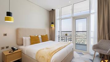 Departamento de lujo, balcón, vista a la ciudad | Tabla de planchar con plancha, cunas, wifi gratis y ropa de cama