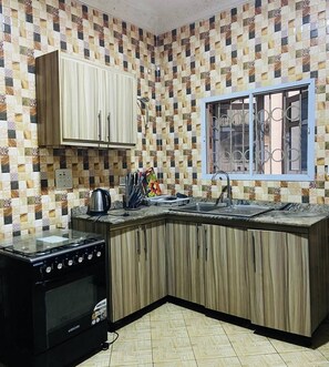 Deluxe Room, Balcony, City View | Private kitchen - Belmont Hotel (Abuja)