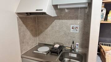 Family Room | Private kitchen | Microwave, rice cooker, cookware/dishes/utensils