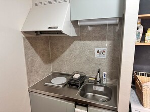 Family Room | Private kitchen | Microwave, rice cooker, cookware/dishes/utensils - Fierement inn (Sapporo)