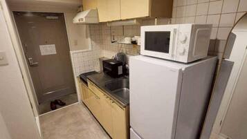 Apartemen | Dapur pribadi | Lemari es besar, microwave, oven, dan kompor