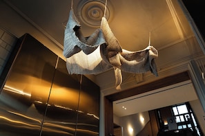 A modern interior with a unique hanging sculpture. - Mercer Madrid  (Madrid)