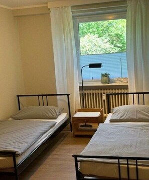 3 quartos, Wi-Fi de cortesia, roupa de cama