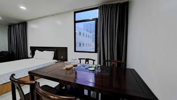 Desk, laptop workspace, free WiFi, bed sheets