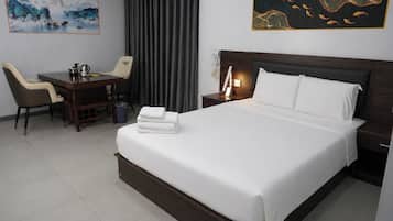 Premium bedding, desk, laptop workspace, free WiFi