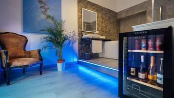 Luxury Double Room | Bathroom | Hair dryer, slippers, towels, soap