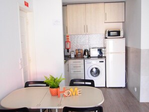 Fridge, microwave, oven, cookware/dishes/utensils