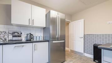 Fridge, microwave, oven, cookware/dishes/utensils