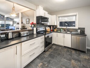 Fridge, microwave, dishwasher, cookware/dishes/utensils