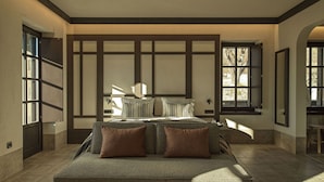 A spacious bedroom with a large bed, a seating area, and large windows providing natural light. - Oreno Mountain Retreat Hotel (Zagori)