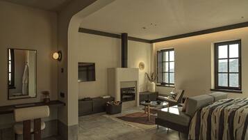 A modern living room with a fireplace, a sofa, a coffee table, and a large window.