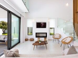 TV, fireplace - Elegante Villa mit beheiztem Pool und fantastischer Aussicht by Interhome (Angeliana Kriti)