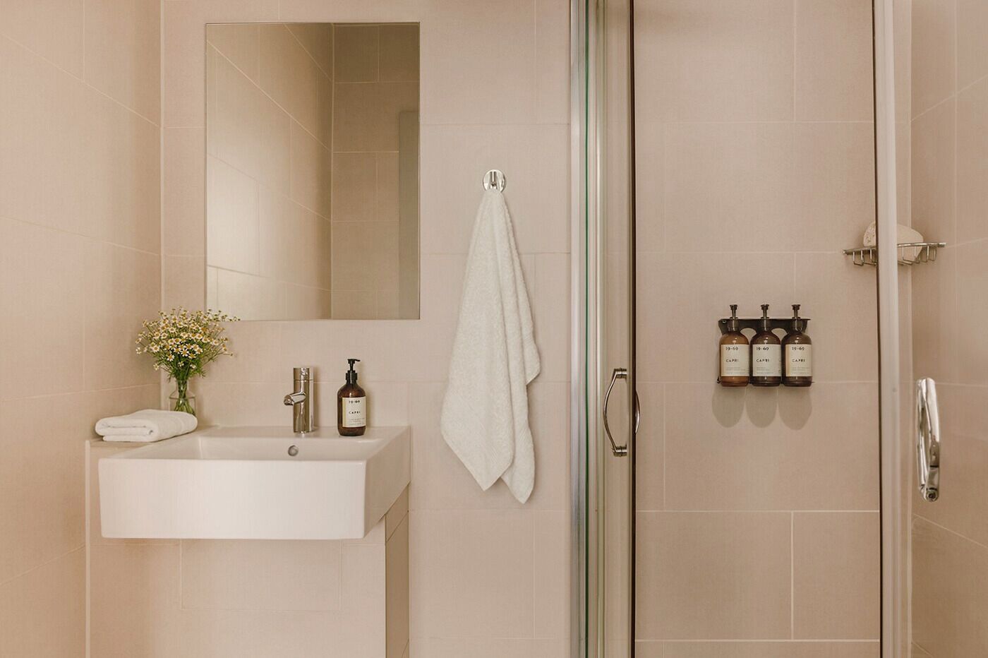 Shower, eco-friendly toiletries, hair dryer, towels