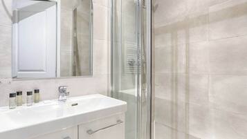 Shower, hair dryer, shampoo