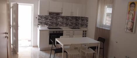 Fridge, microwave, oven, cookware/dishes/utensils