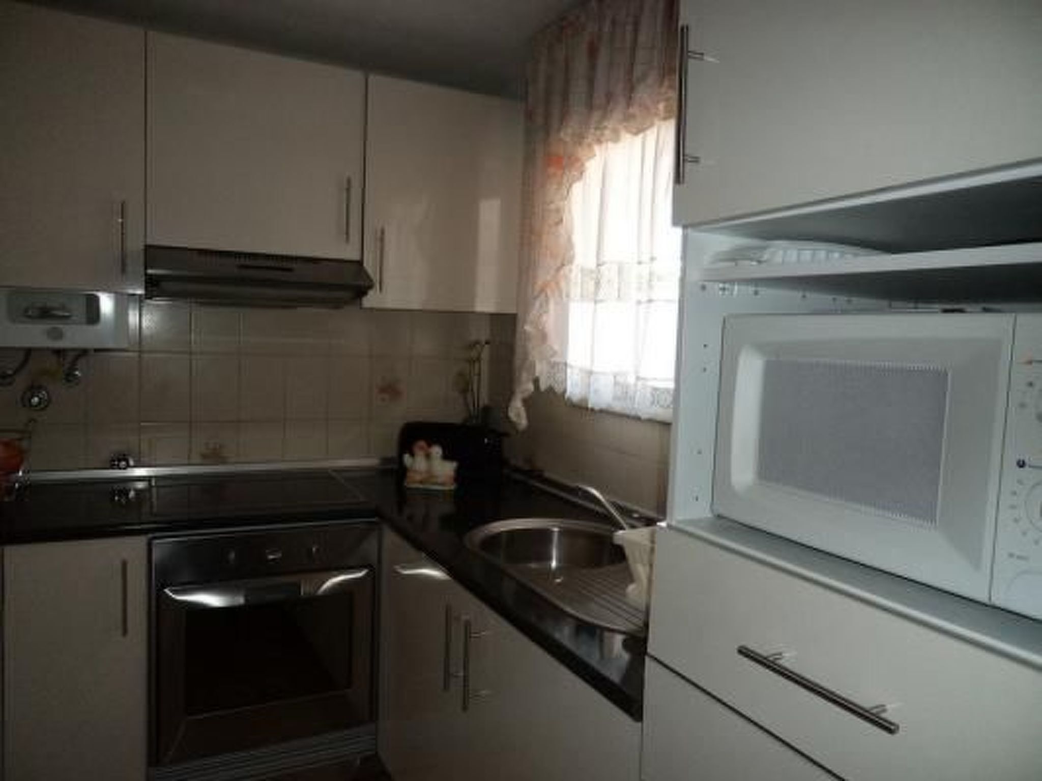 Fridge, microwave, oven, cookware/dishes/utensils