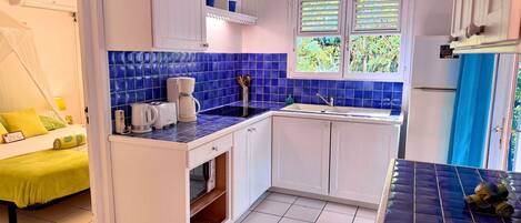 Fridge, microwave, cookware/dishes/utensils