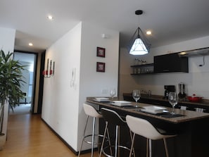 Fridge, microwave, cookware/dishes/utensils