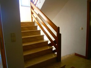A wooden staircase with a handrail leading to a landing. - Ferienvilla "Fabulous Vila Ivanka" by Interhome (Čitluk)