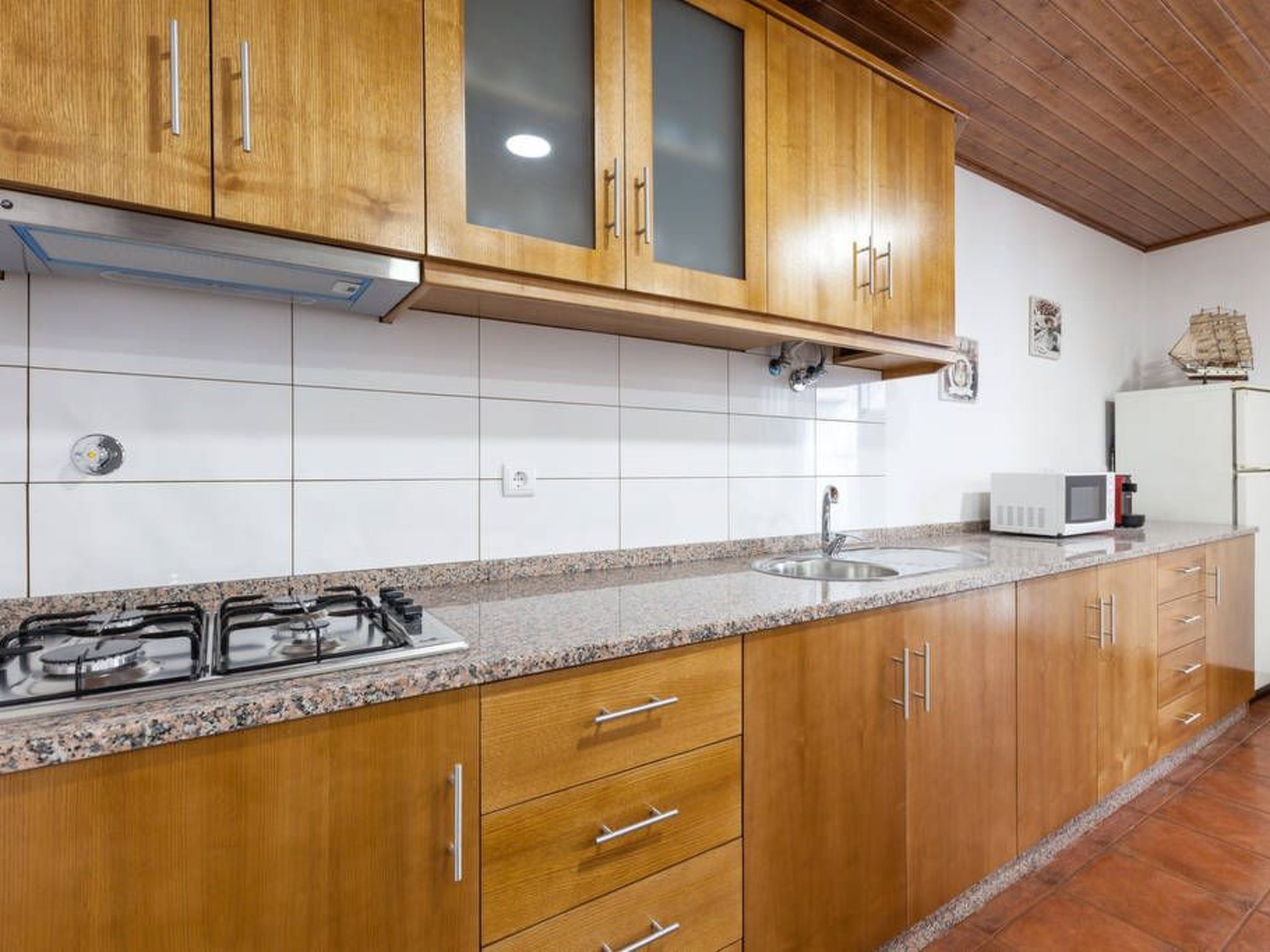 Fridge, microwave, cookware/dishes/utensils