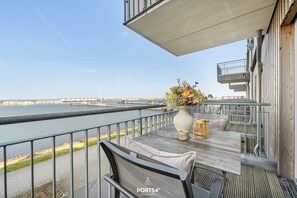 Outdoor dining - St. Tropez - 2nd Floor, Balcony, Harbor View, Private Parking, Washing Machine (Olpenitz)