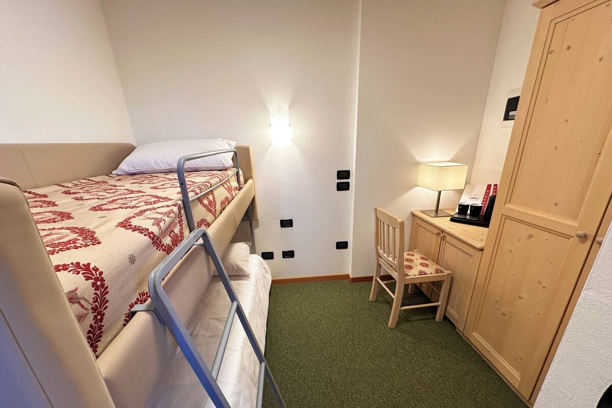 Family Quadruple Room, Balcony | Down comforters, in-room safe, cribs/infant beds, free WiFi