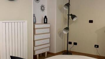 Deluxe Apartment, Kitchen, Garden View | In-room safe, blackout drapes, iron/ironing board, free WiFi