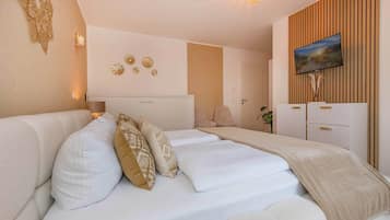 2 slaapkamers, een strijkplank/strijkijzer, gratis wifi