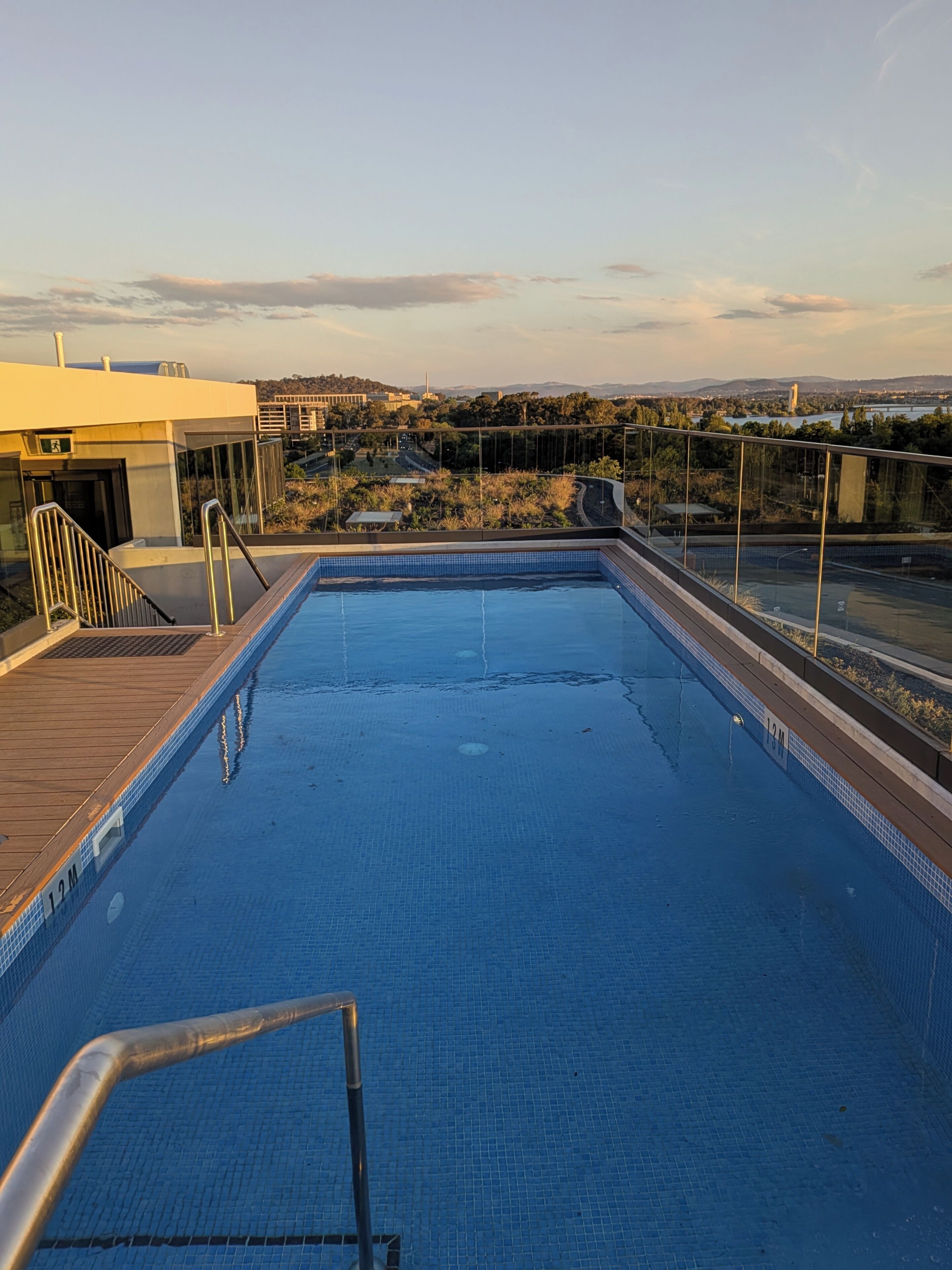Centrally located new apartment with free parking and access of pool , gym