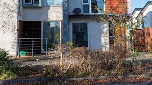 A modern two-story residential building with a flat roof, large windows, and a satellite dish. - Family 3 Bedroom House by Guestz (Manchester)