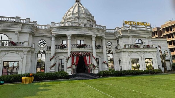 A grand building with a central dome, large windows, and a formal entrance. - Reeti Rivaaj Hotel Patna (Danapur)