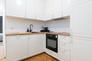 Apartment, Balcony | Private kitchenette - RentPlanet - Apartament Chmielna (Warsaw)