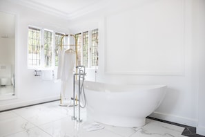 Luxury Duplex, Courtyard View | Bathroom | Separate tub and shower, hair dryer, towels, soap - Le Manoir Boutique Estate (Johannesburg)