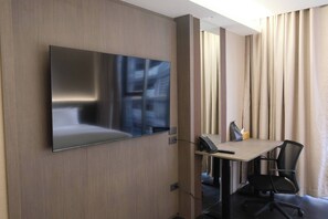 In-room safe, desk, laptop workspace, blackout drapes - Bangkok City Rama 9 Hotel (Dindaeng)