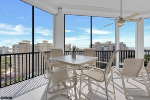Outdoor dining - EXCLUSIVE GATED WATERFRONT 2B/2B PENTHOUSE CONDO AT WATERSIDE III 3H1 (Fort Myers Beach)
