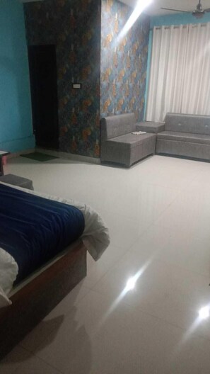 Habitación superior | Camas extra, wifi gratis y ropa de cama 