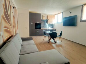 Living area - Suite  APARTMENTs  4 mori   pied a ter (copy) by Interhome (Chia)