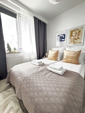 1 habitación, tabla de planchar con plancha, wifi gratis y ropa de cama 